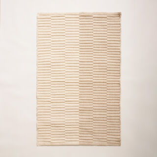 Hand woven rug size 120*75cm beige