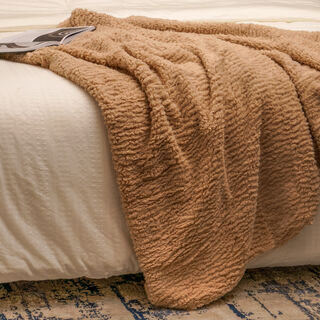 Textured embossed sherpa fur throw