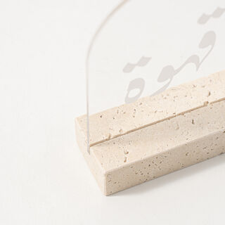 Dallaty Clear Acrylic Stand With Travertine Base White Text
