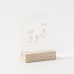 Dallaty Clear Acrylic Stand With Travertine Base White Text image number 0