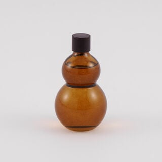 معطر جو زجاج بأعواد عطرية برائحة رمال العنبر