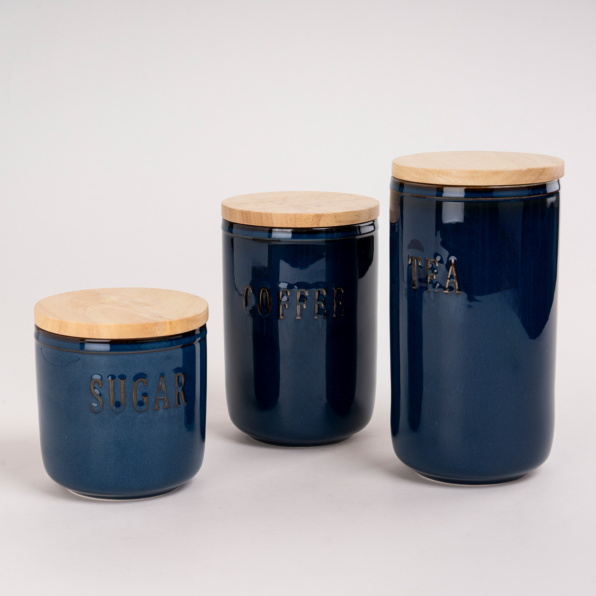 

3 piece blue porcelain canister set