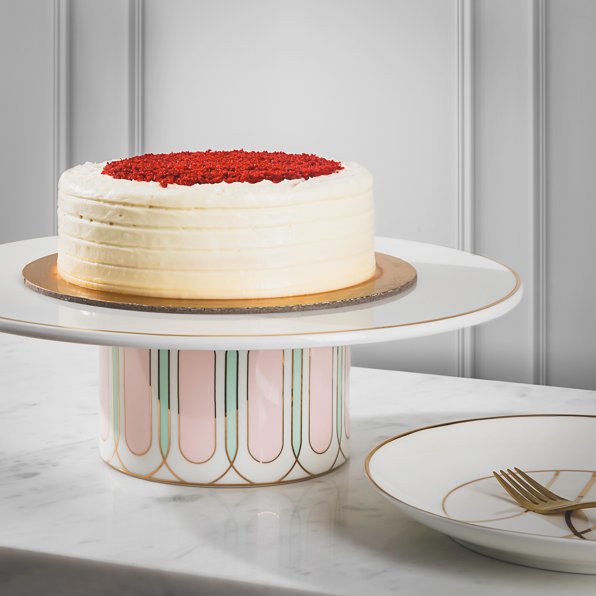 

La Mesa white porcelain cake stand with pink base
